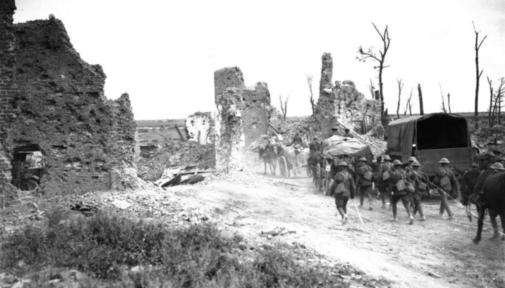 123_Canadian Infantry and Transport passing through captured village. Advance East of Arras. September, 1918.
